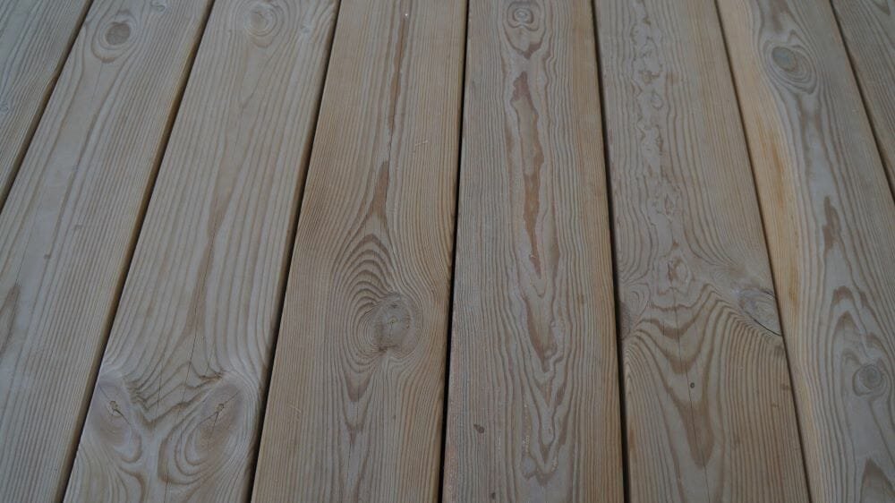 spaces of impregnated pine boards