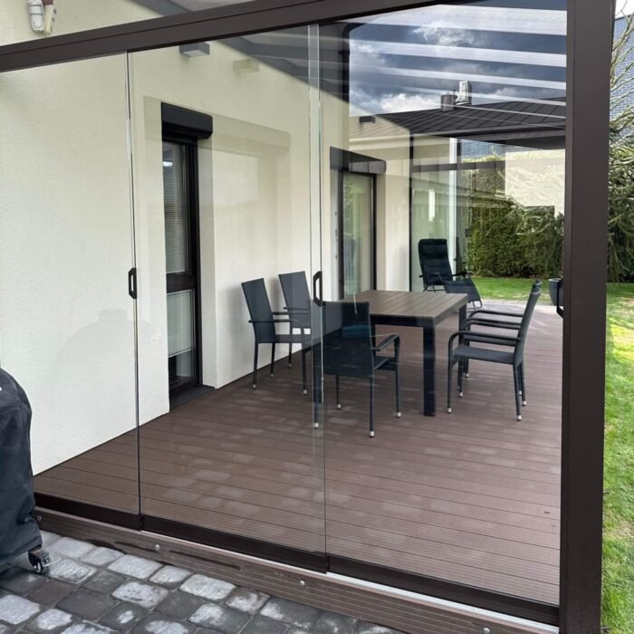 Brown frameless sliding glazing system for terrace 4 rails - Image 4